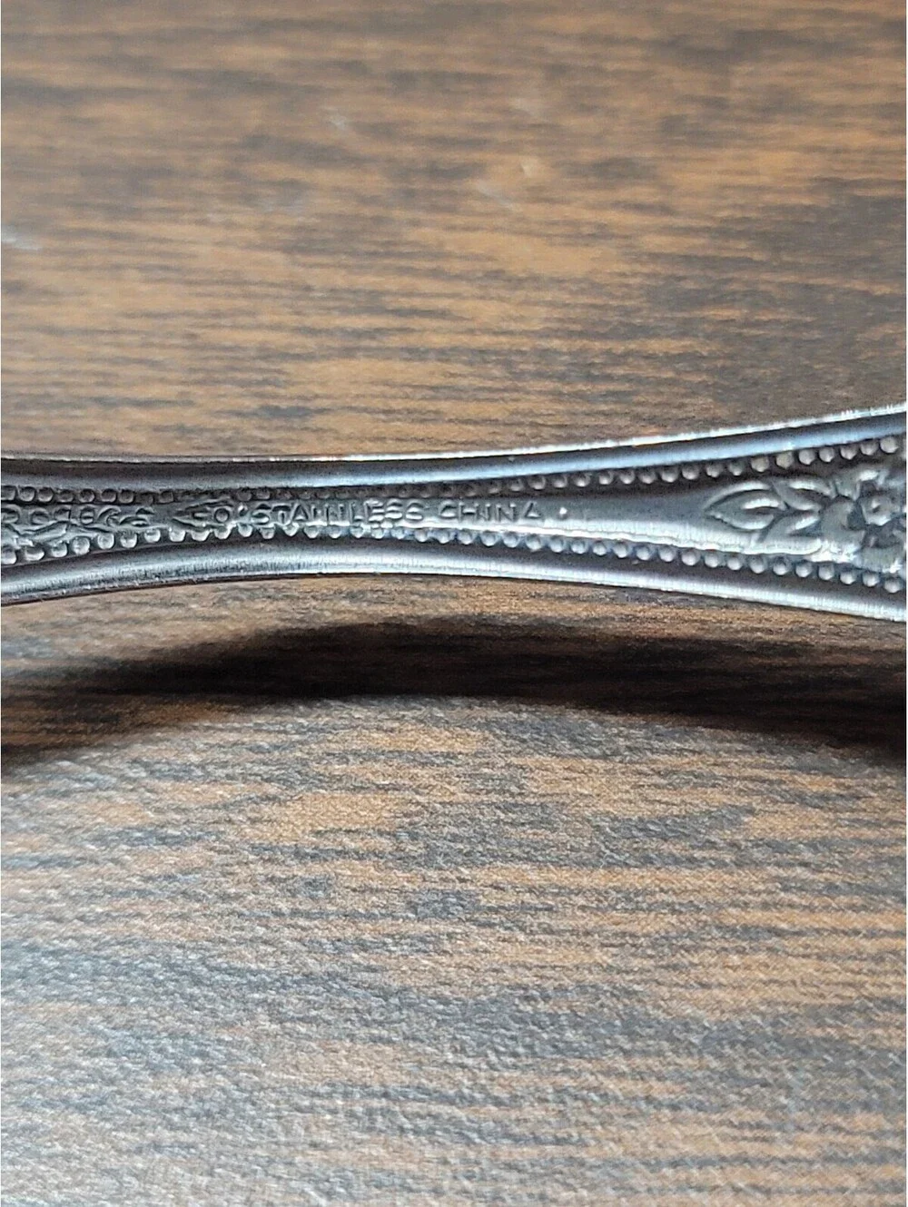 Vintage Stainless Steel Spoon and Fork Set with Ornate Floral Handles